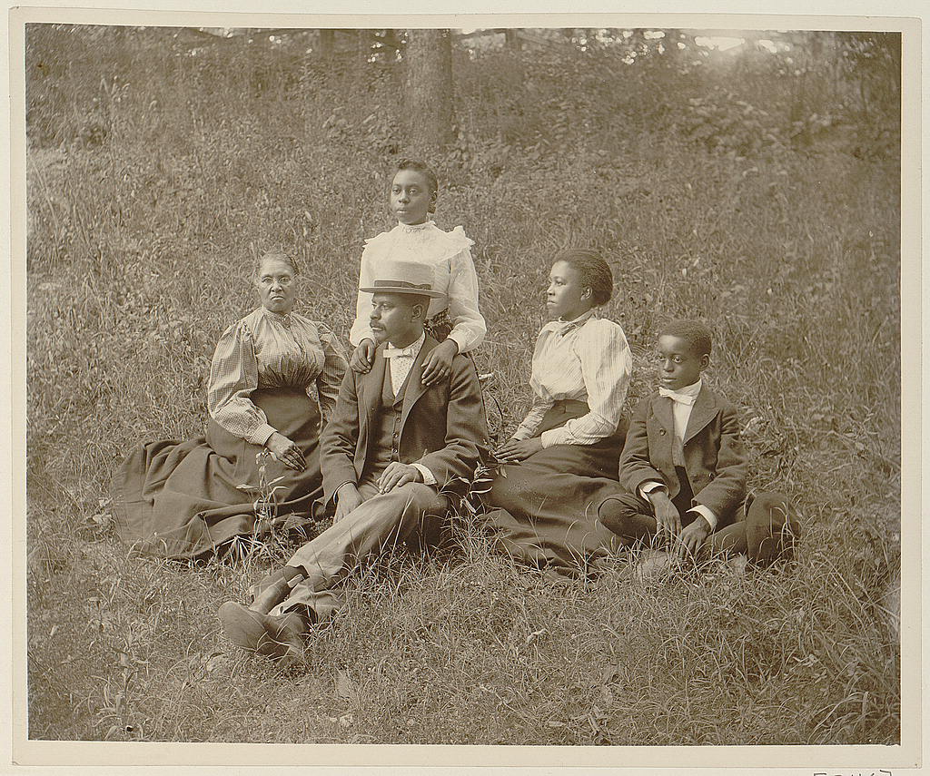 [African American family posed for portrait seated on lawn], 1899 (Library of Congress)