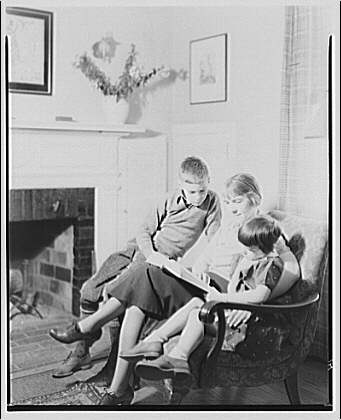 Art Brown and family. Brown family reading in chair II, 1937 (Library of Congress)