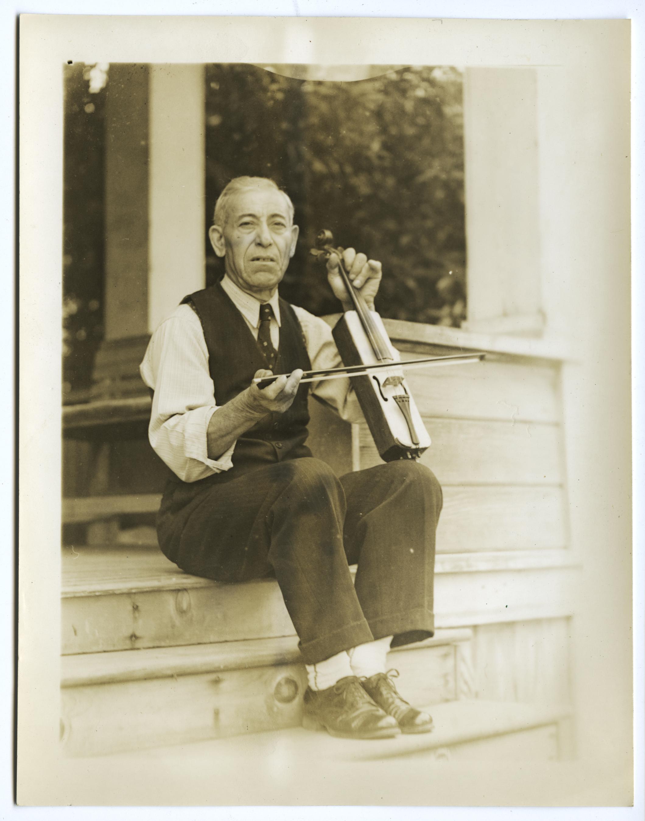 Bedros Haroutunian playing kamanche, 1939 (Library of Congress)