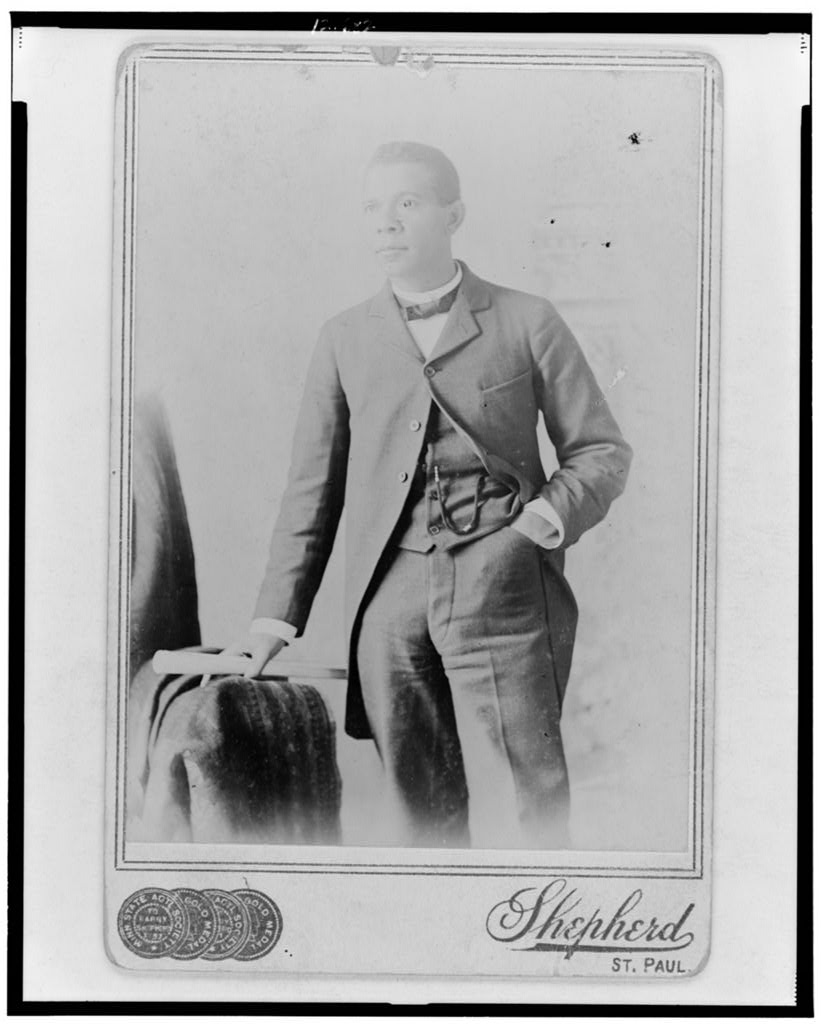 [Booker T. Washington, three-quarter length portrait, standing, facing left], 1880 (Library of Congress)