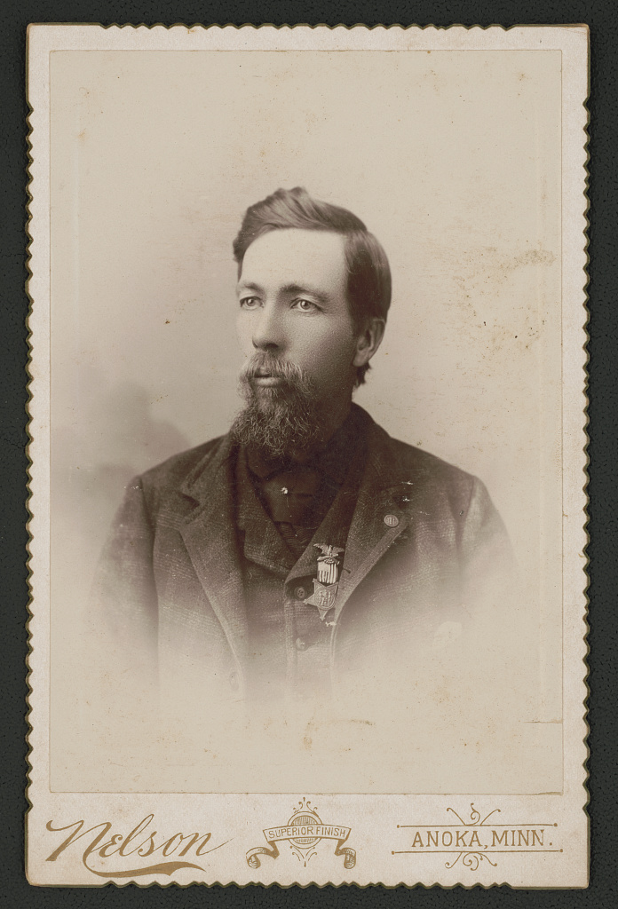 [Civil War veteran Alfred Colburn of Co. K, 1st Minnesota Infantry Regiment and 2nd Minnesota Light Artillery Battery with medal], 1900 (Library of Congress)