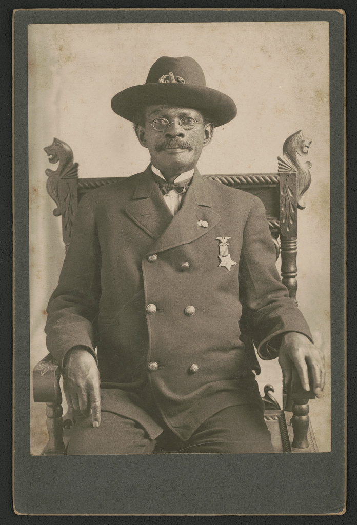 [Civil War veteran John W. Pollard, who served under the name of Private Jackson Ridgway in the 83rd U.S. Colored Troops (USCT), in Grand Army of the Republic uniform with medal], 1906 (Library of Congress)