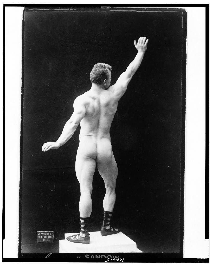 [Eugen Sandow, full-length nude portrait, standing, rear view, right arm raised], 1894 (Library of Congress)