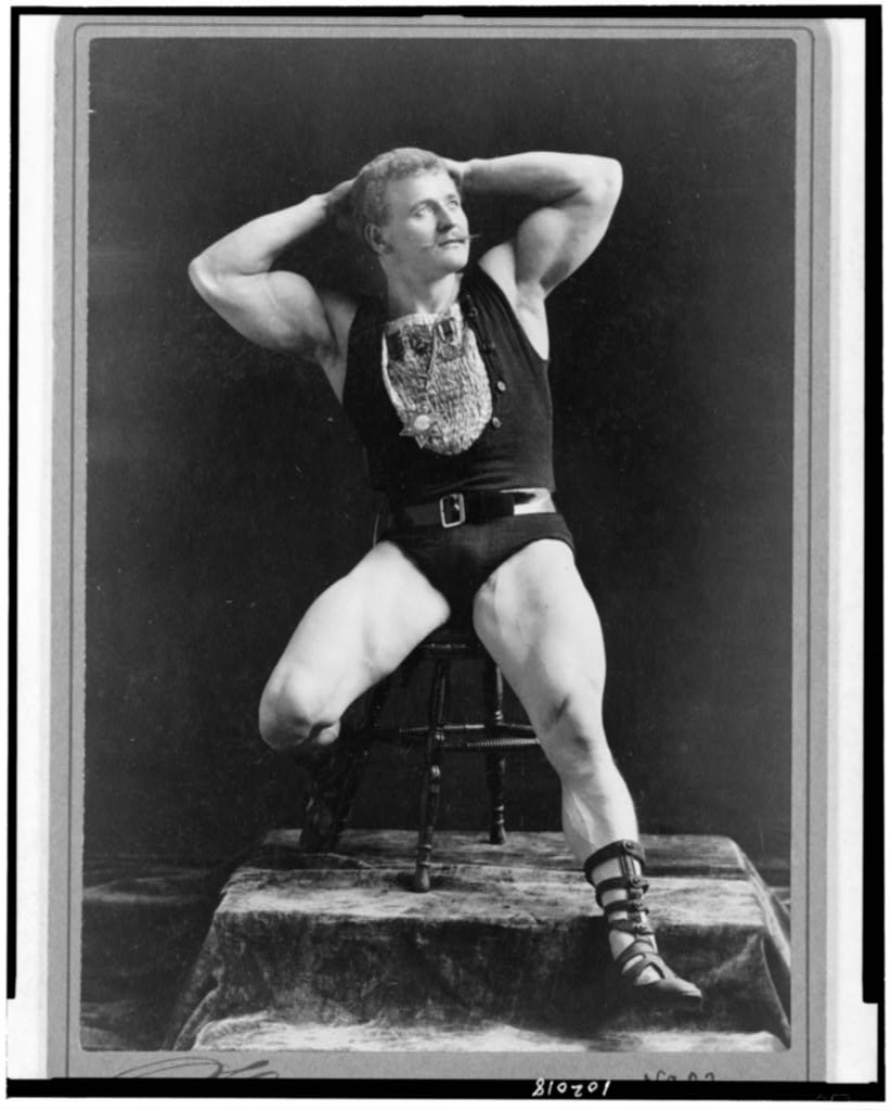 [Eugen Sandow, full-length portrait, seated, facing right, hands behind head], 1893 (Library of Congress)