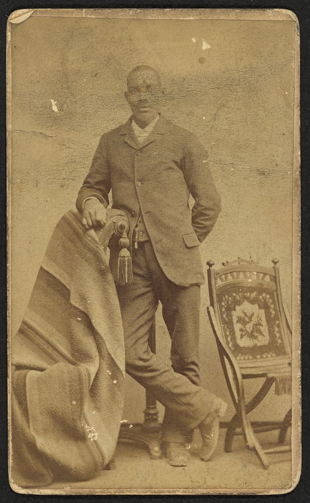 [Full-length portrait of an African American man standing among some props, facing front], 1880 (Library of Congress)