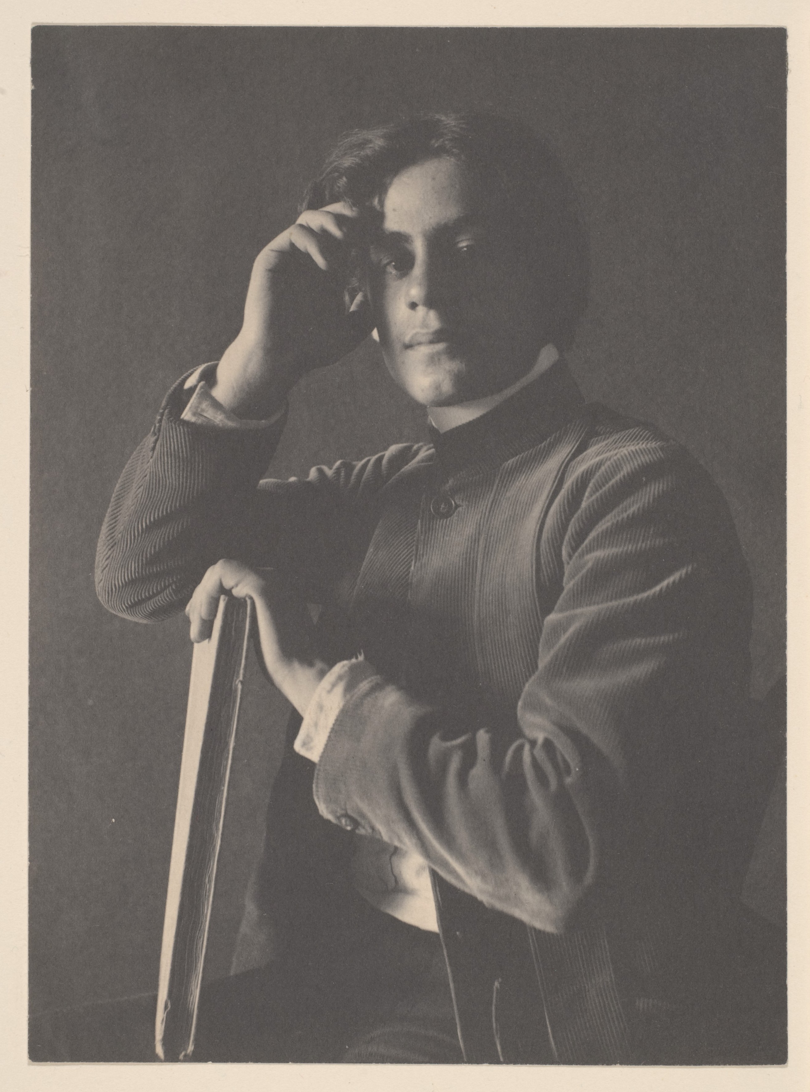 Kahlil Gibran with Book, 1896 (Internet Archive)