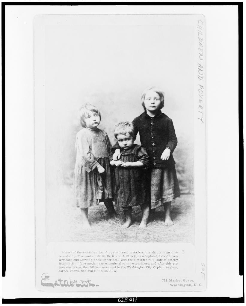 Picture of three children found by the Humane Society in a shanty in an alley bounded by Four-and-a-half, Sixth, K and L Streets, in a deplorable condition--wretched and starving, their father dead, a, 1890 (Library of Congress)