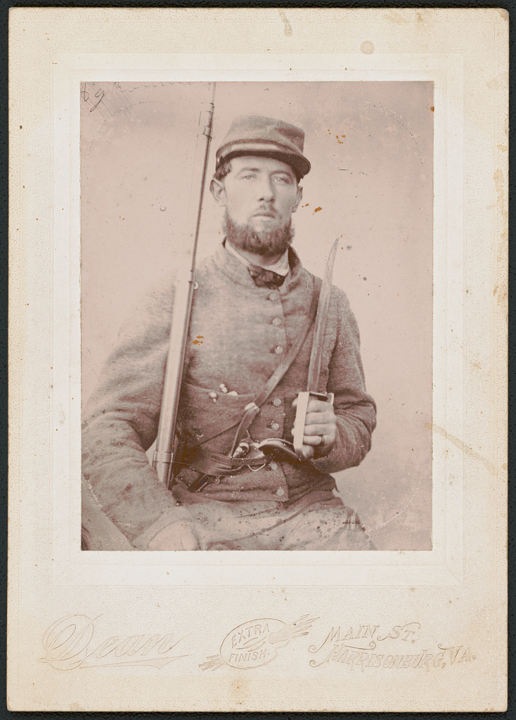 [Private Addison J. Bowman of Co. K, 57th Virginia Infantry Regiment in uniform with rifle, revolver, and D guard Bowie knife], 1861 (Library of Congress)