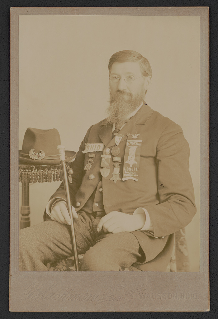 [Unidentified Civil War veteran with medals and G.A.R. Post No. 35, Wauseon, Ohio, ribbon], 1880 (Library of Congress)