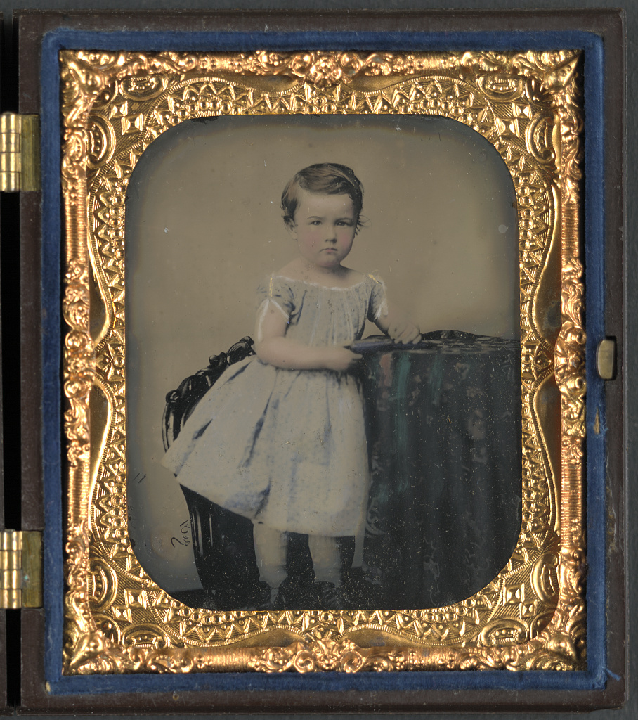 [Unidentified young boy with cased photograph], 1860 (Library of Congress)
